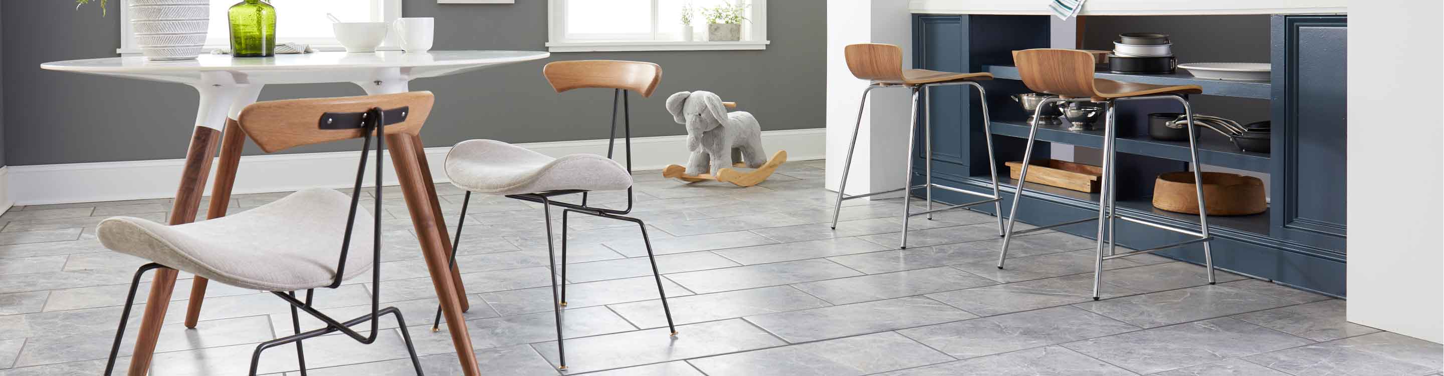 Gray tile flooring in a dining area